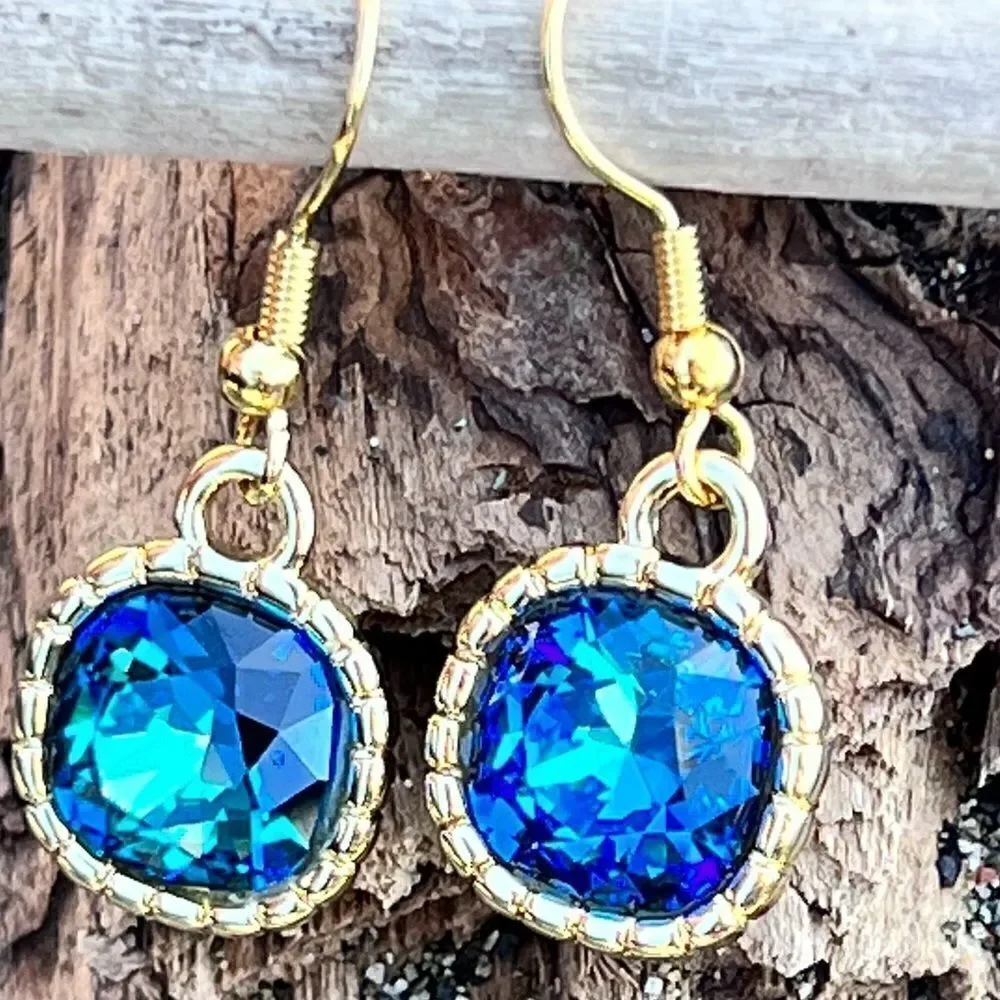 Earrings made with Bermuda Blue Swarovski crystal and gold earwires handcrafted